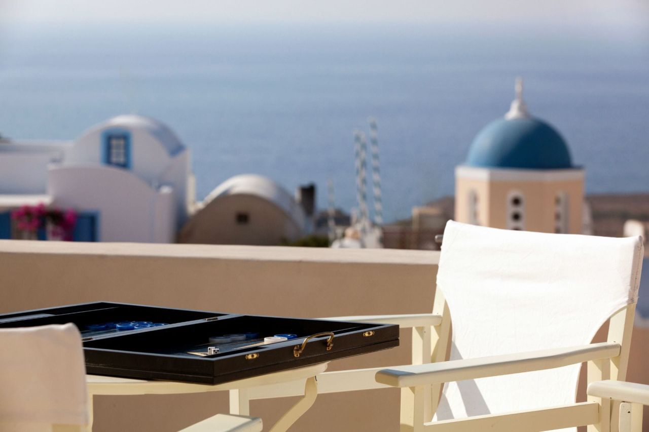 Oia Mansion - Luxurious Mansion Rental in Santorini - First class view of the Aegean Sea from balcony