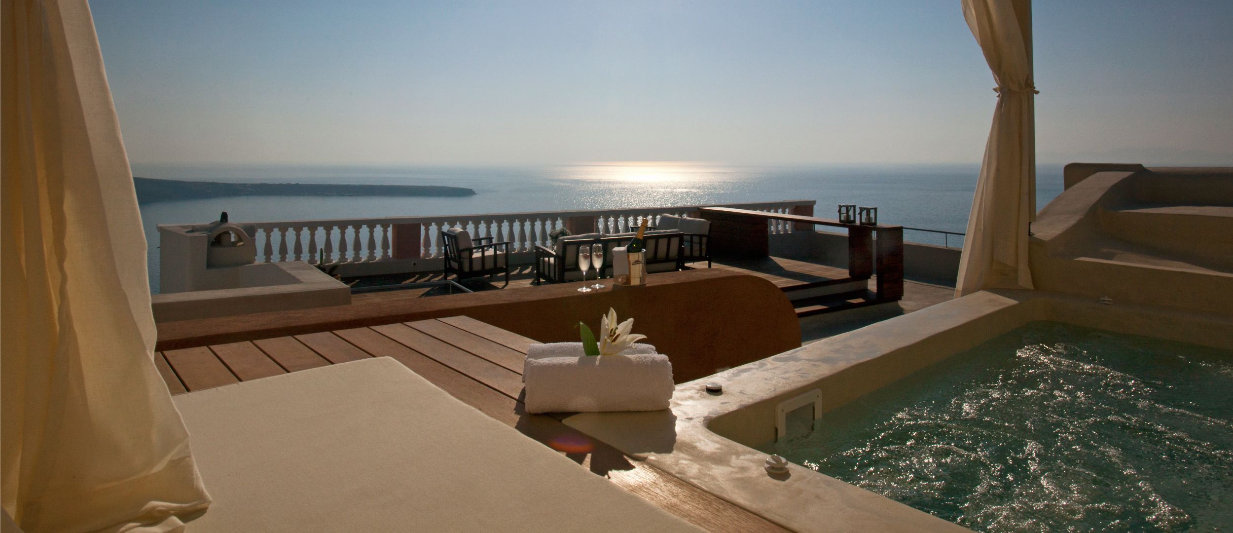 Jacuzzi with the Best View - Oia Mansion - Luxurious 4 Bedroom Mansion Rental in Santorini