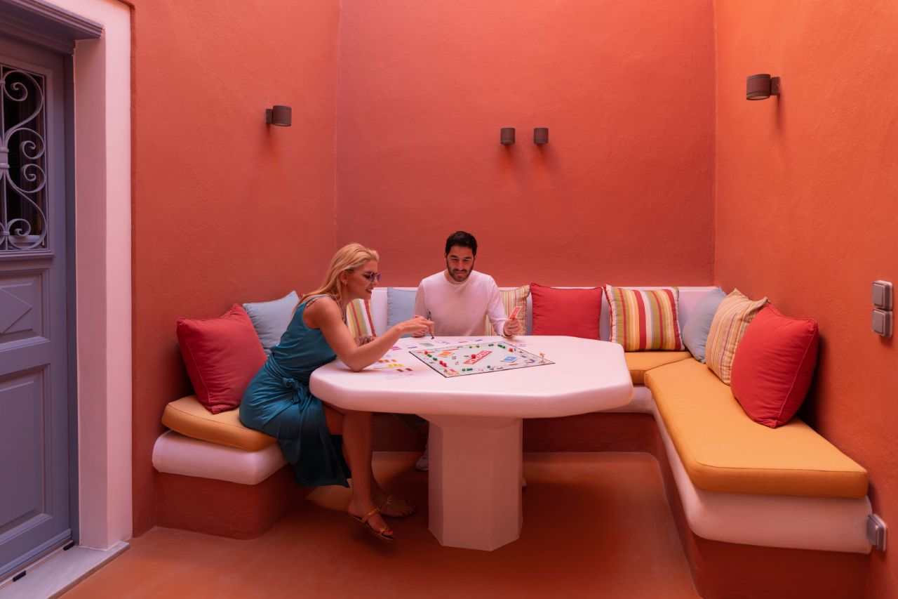 Oia Mansion - Luxurious Mansion Rental in Santorini - Playing a board game
